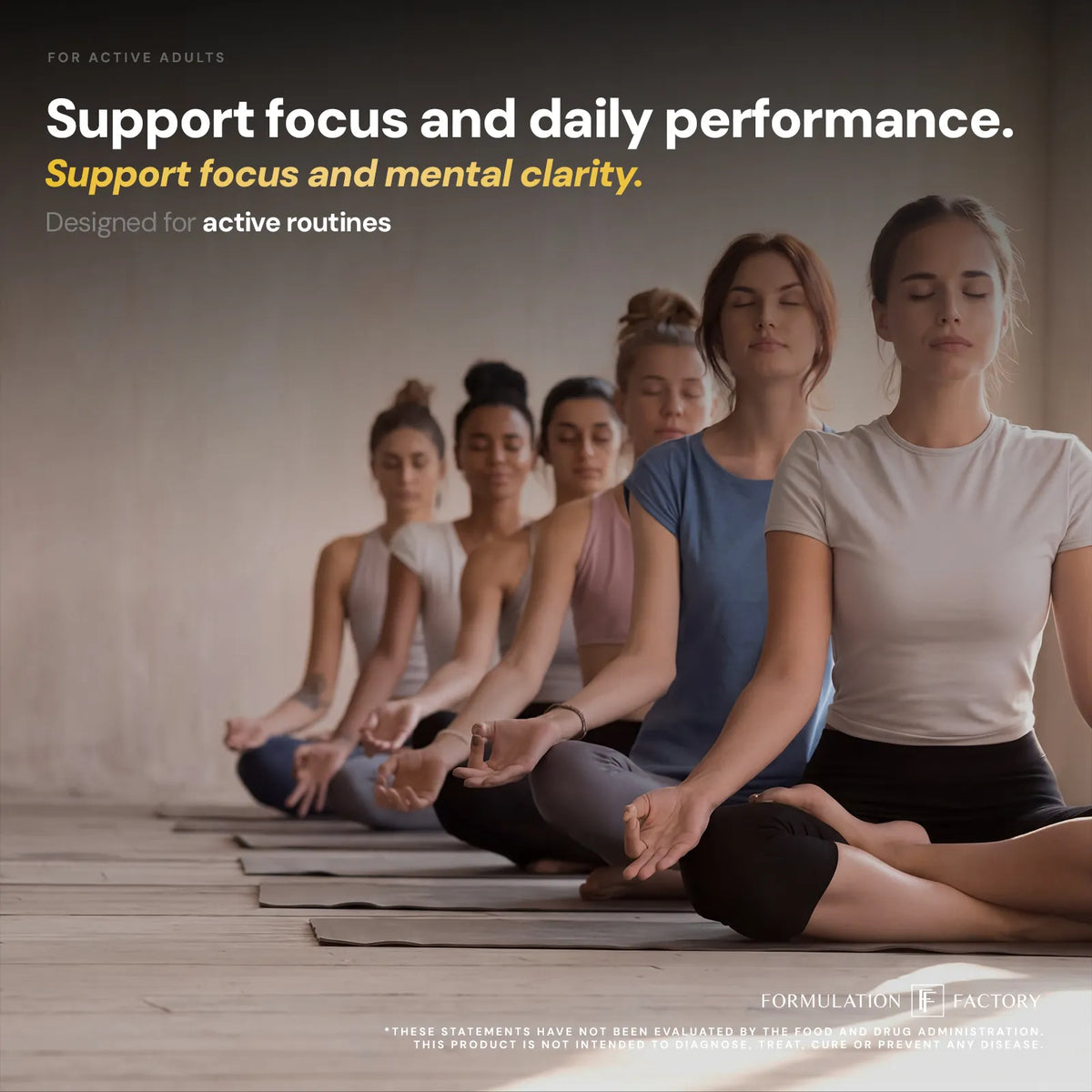 A group of women sitting in a row practicing yoga and meditation for focus and mental clarity, aligned with Heart of Steel's daily active routine support.